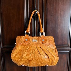 SÉCRET PON PON Leather tote.